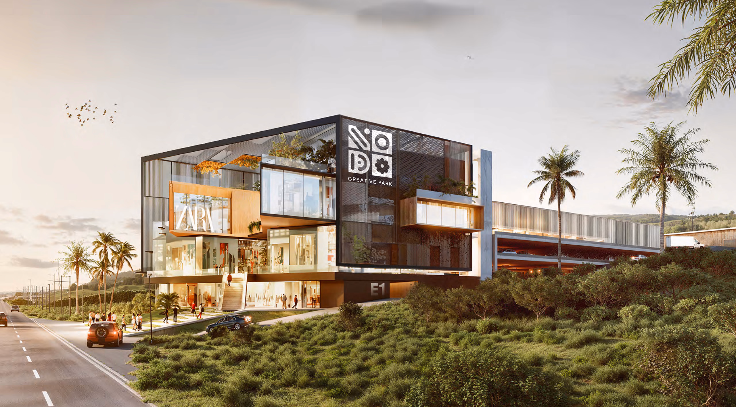 Vista frontal del desarrollo Nodo Creative Park con arquitectura moderna y fachada de cristal